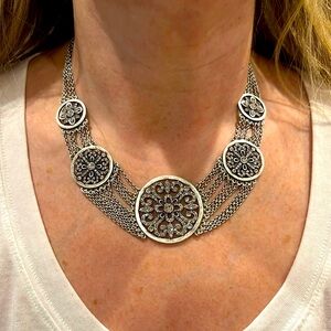 Necklace with adjustable length.